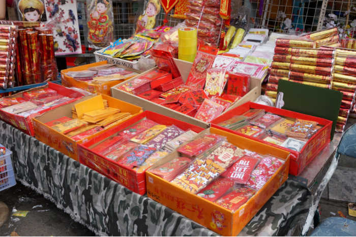 Chinese New Year market stall. Temporary market stall stocked with money envelopes