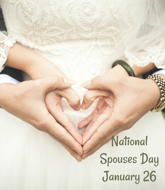 bride and groom with heart shaped hands Pay special attention to your mate on National Spouses Day - January 26