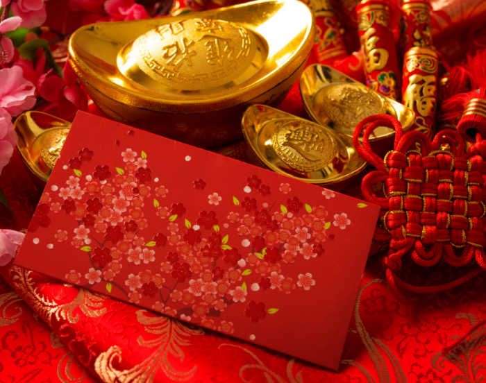 Red and gold decorations for Chinese New Year Red and gold decorations and money envelopes.