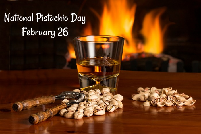 Pistachio nuts, drink and a fire National Pistachio Day - February 26