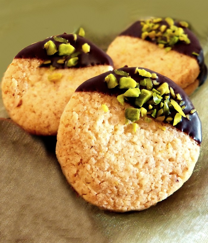 Shortbreads dipped in chocolate and pistachios