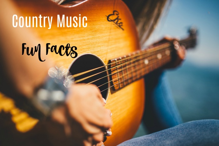 man playing a quitar with a text overlay about country music Country music fun facts