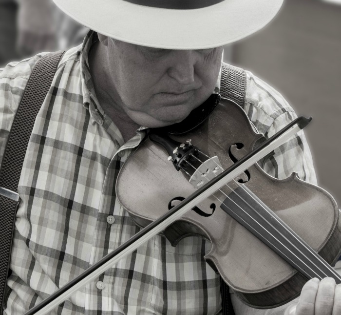 man playing the fiddle Fiddler
