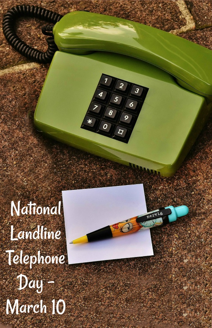 green landline phone, and pad and pen National Landline Telephone Day is March 10.