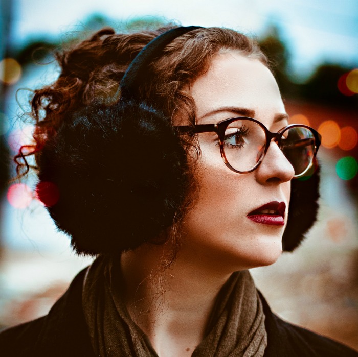lady wearing earmuffs Lady wearing earmuffs