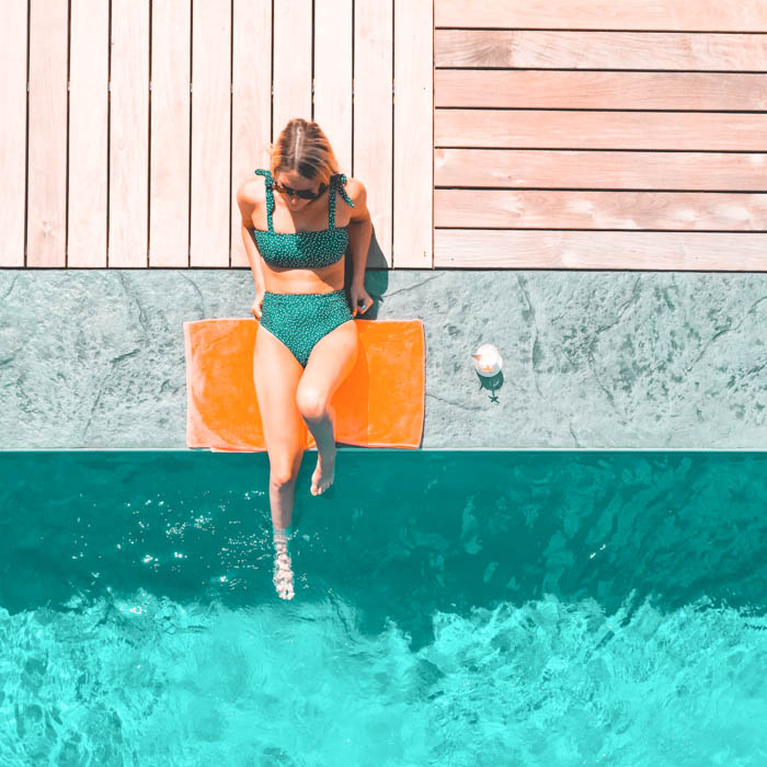 relaxing poolside in a bikini