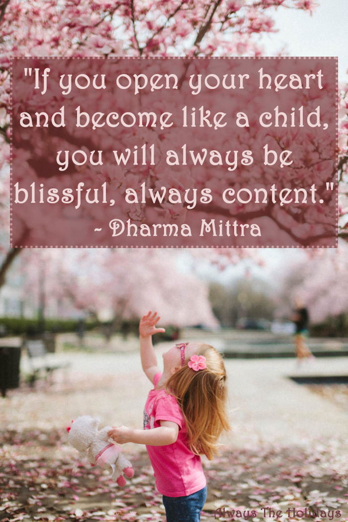 A little girl looking up at a cherry blossom tree with a text overlay reading "If you open your heart and become like a child you will always be blissful, always content" - Dharma Mittra If you open your heart and become like a child you will always be blissful, always content quote
