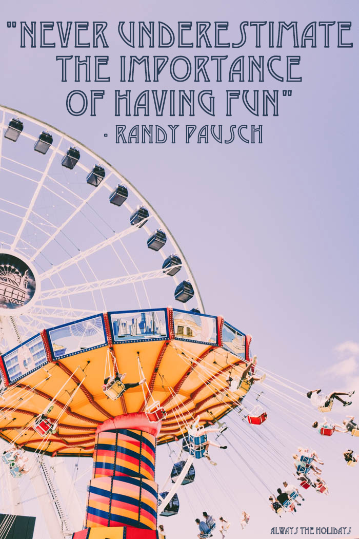 An amusement park with a ferris wheel and swinging chair ride with a text overlay that reads "Never underestimate the importance of having fun" - Randy Pausch Never underestimate the importance of having fun quote