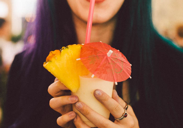 a good pina colada garnished with a pineapple and an umbrella a good pina colada garnished with a pineapple and an umbrella