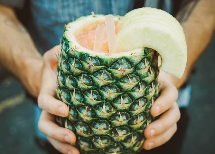 Piña colada in a pineapple