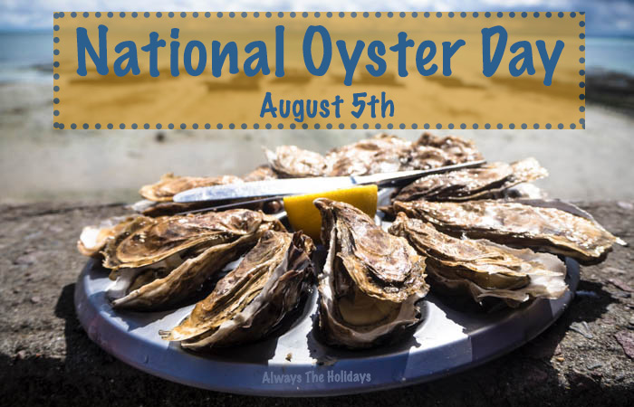 A plate of oysters on a stone near the beach with a text overlay reading "national oyster day August 5" National Oyster Day Photo
