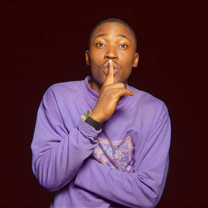 A man making the "shh" symbol, who is trying to stop the spread of gossip Don't spread gossip, especially on National Gossip Day!