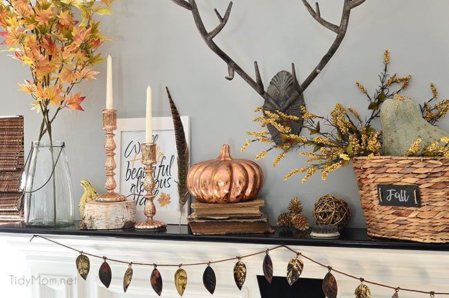 copper and leaves combine in this fall mantle decoration idea