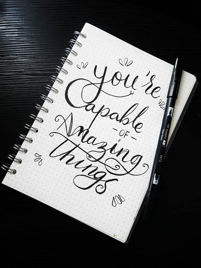 calligraphy of the words you're capable of amazing things you're capable of amazing things quote