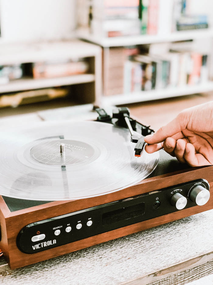 a victrola turntable with a clear vinyl record spinning on it vinyl turntable