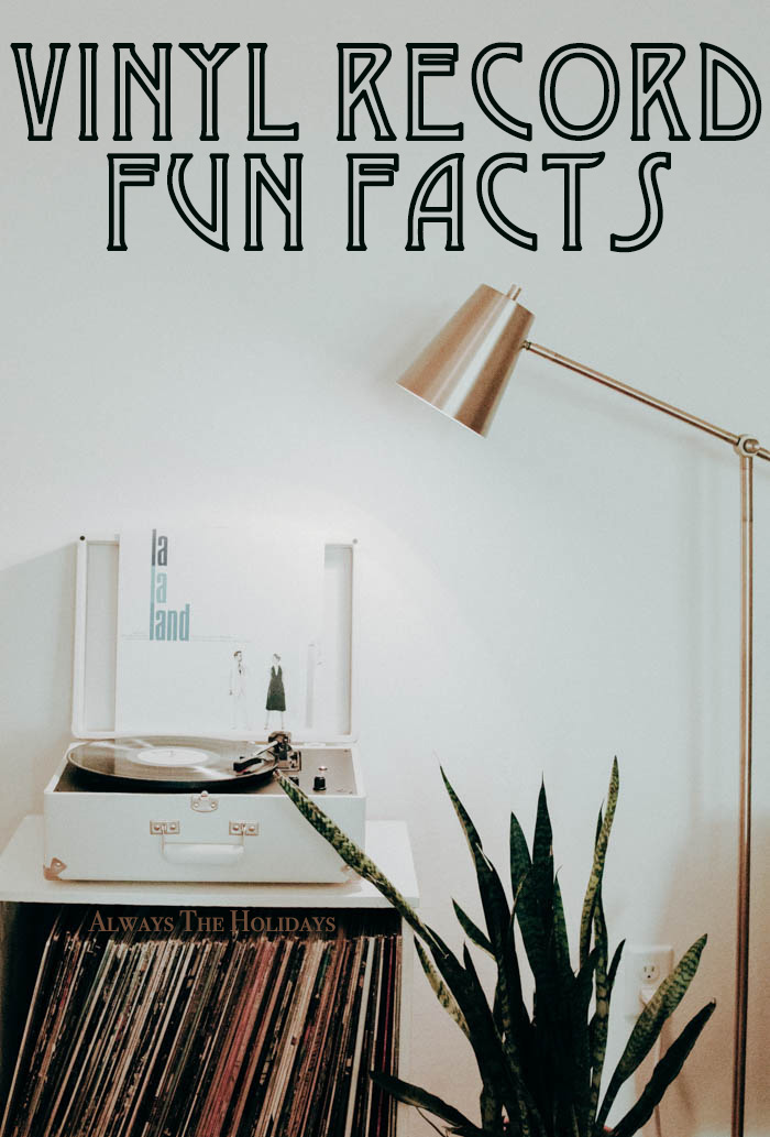 a record player on top of a record stand in a living room with a text overlay reading vinyl record fun facts vinyl record fun facts