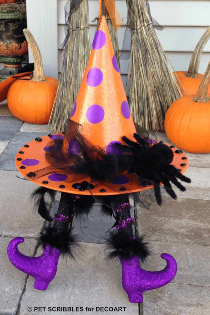 Witch hat sitting on witches legs