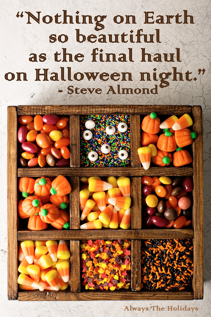A box of divided Halloween candy and a quote text overlay. A box with divided compartments of Halloween candy and a quote Halloween overlay.