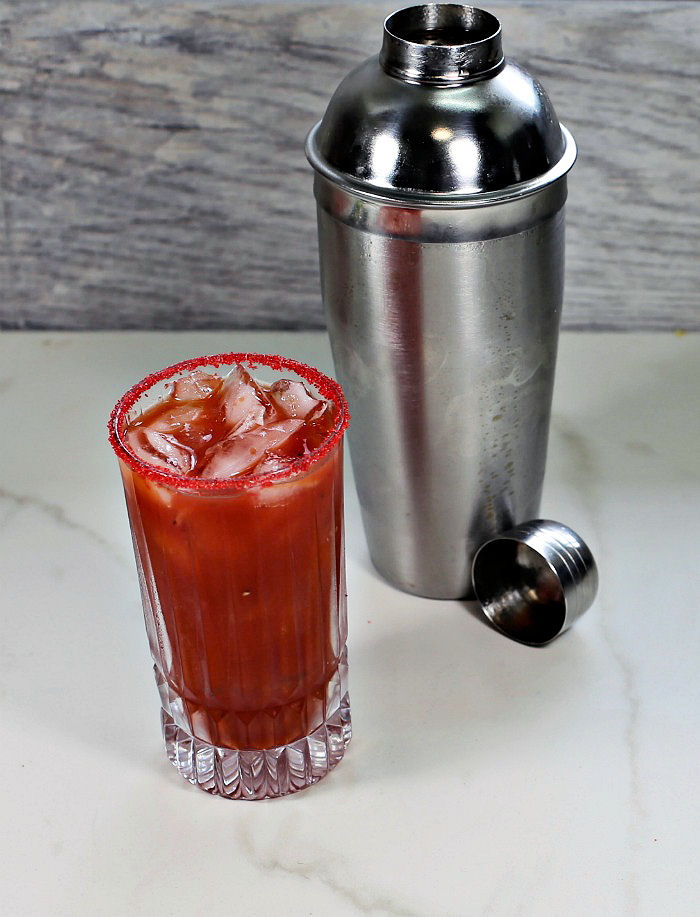 Bloody Mary drink and cocktail shaker.