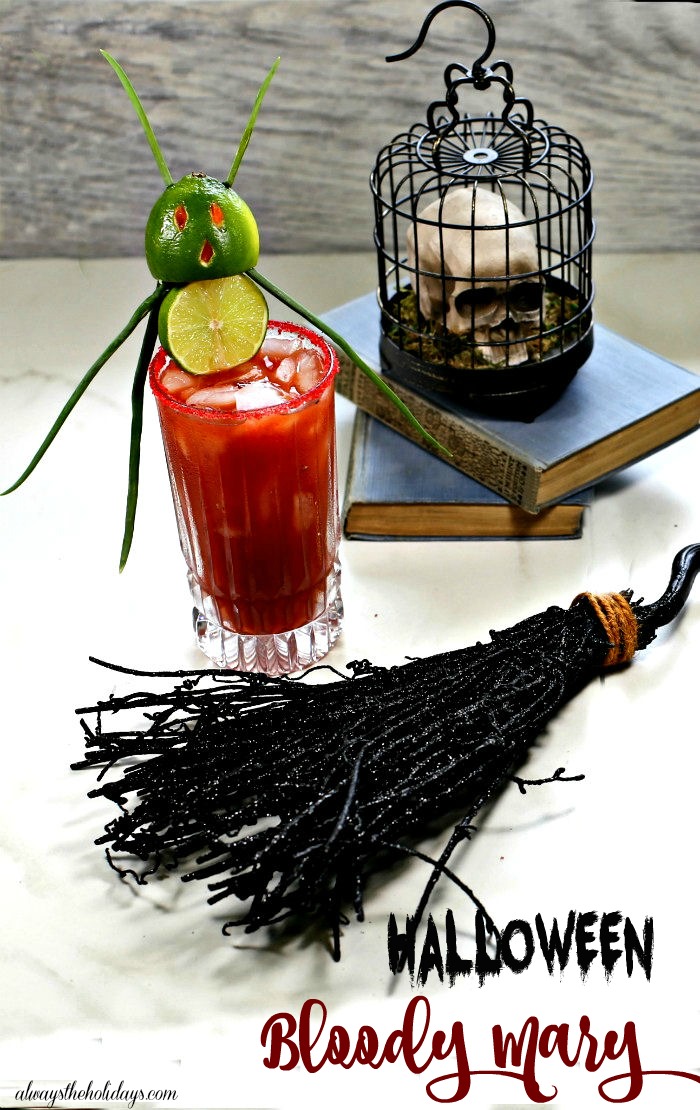 Halloween Bloody Mary cocktail with a lime devil garnish.