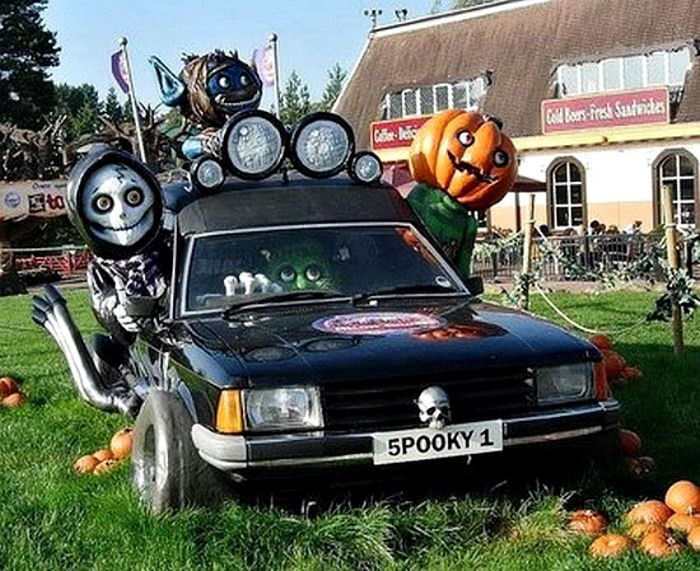 spooky car with decorations Halloween car decorations: Hearse decorated for Halloween.