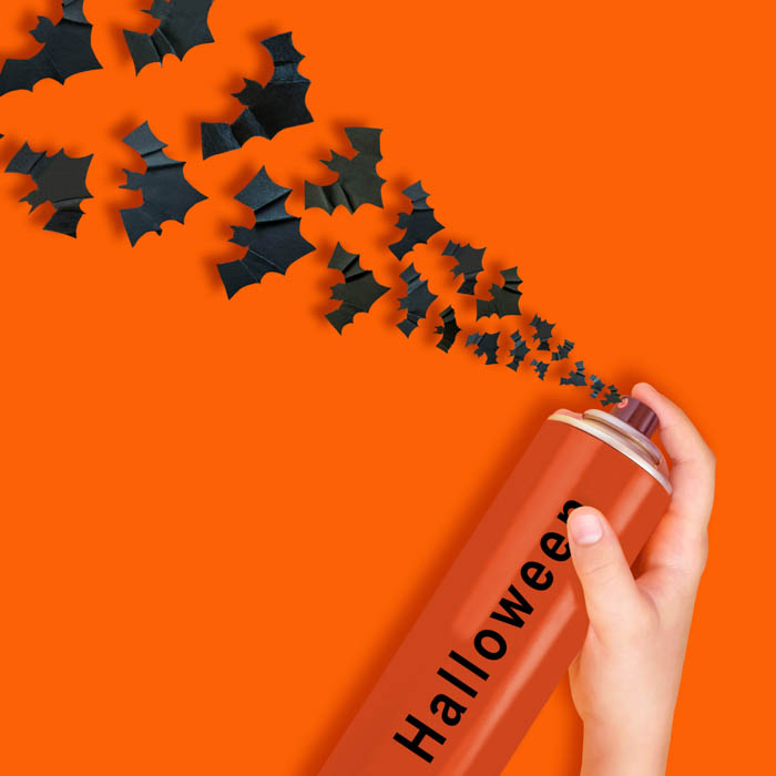 A spray can labeled "Halloween" that sprays out bats.