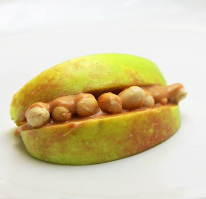 Peanuty monster mouth Apple mouth with peanut butter and peanuts
