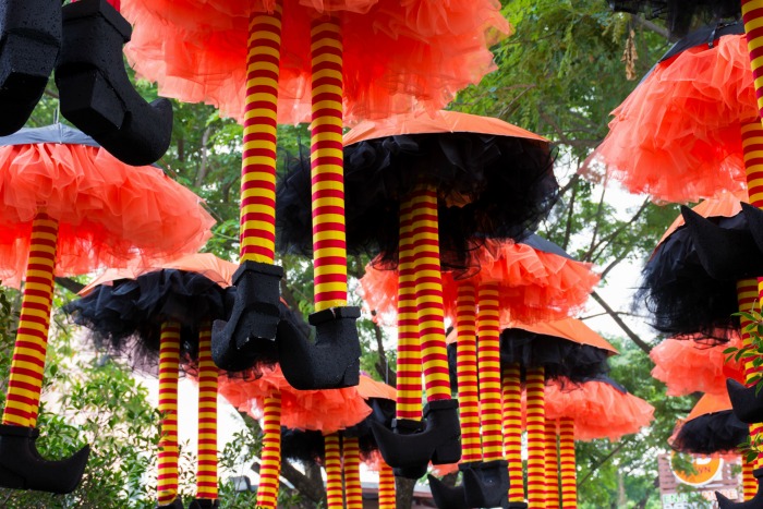 Umbrellas and petticoats with witches legs.