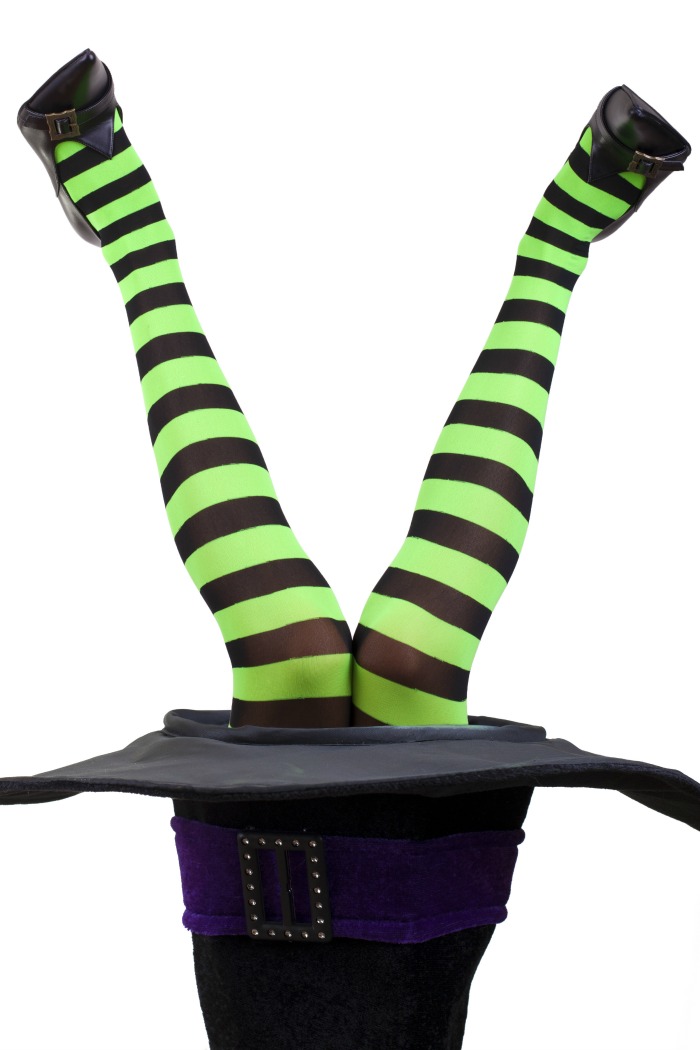upside down witches legs. Witches hat with witch leg stakes in it.