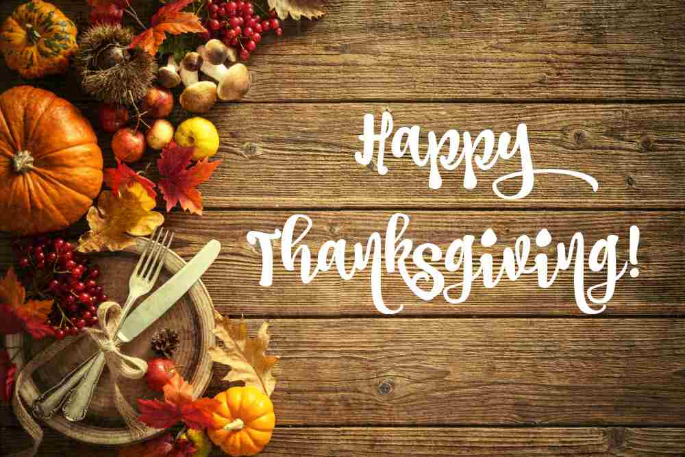 Happy Thanksgiving. Fall food with knife and fork and words Happy Thanksgiving.