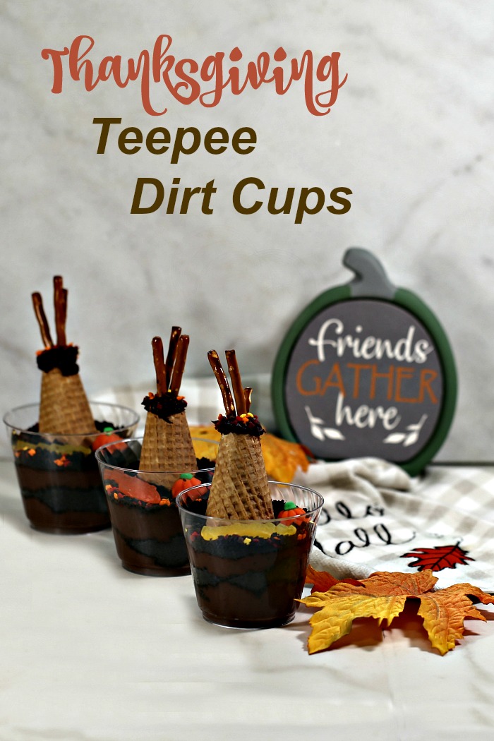 Three dirt desert cups with pumpkin and fall leaves and text reading "Thanksgiving teepee dirt cups."