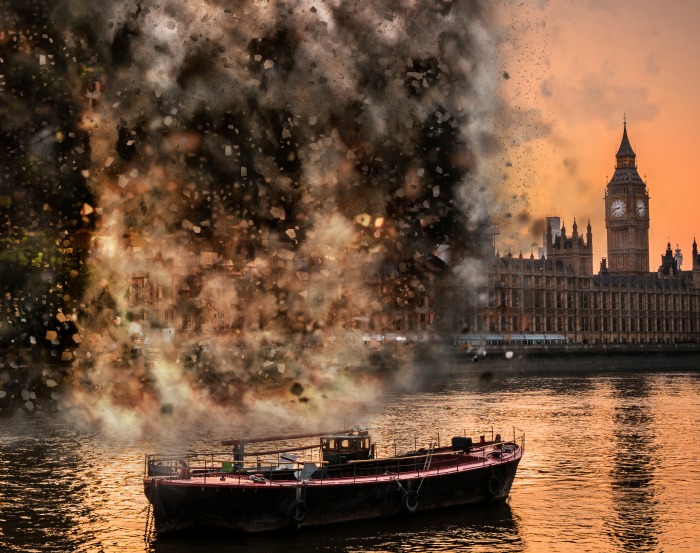 Parliament and boat on river.