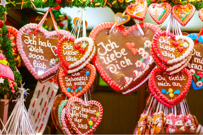 Gingerbread cookies with love messages hanging in a booth at a Christmas Market in Germany.