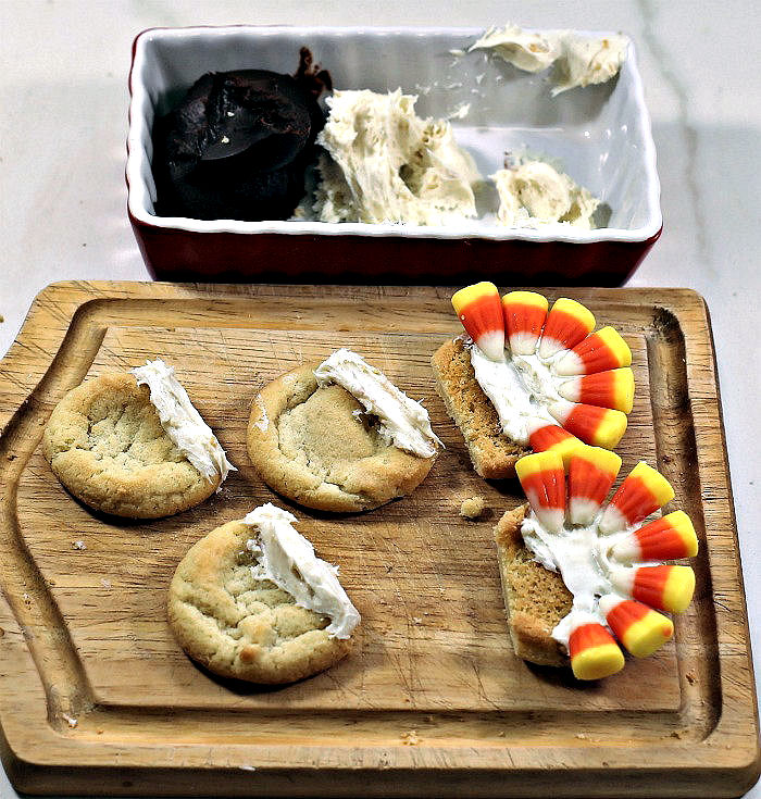 candy and frosting on cookies.