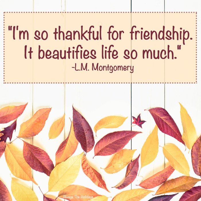 Leaves on a white board with the Thanksgiving quote for friends reading "I'm so thankful for friendship. It beautifies life so much." in a text overlay.