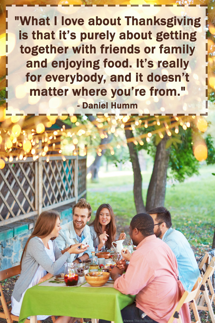 A table of friends in a backyard with a Thanksgiving friend quote text overlay.
