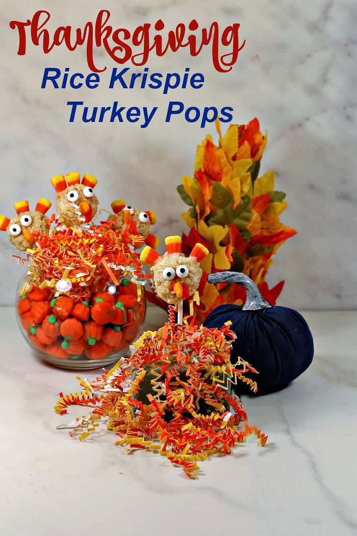 Thanksgiving Rice Krispie turkey pops Turkey pops in bowl of candy pumpkin and crinkled paper with words reading "Thanksgiving Rice Krispie turkey pops."