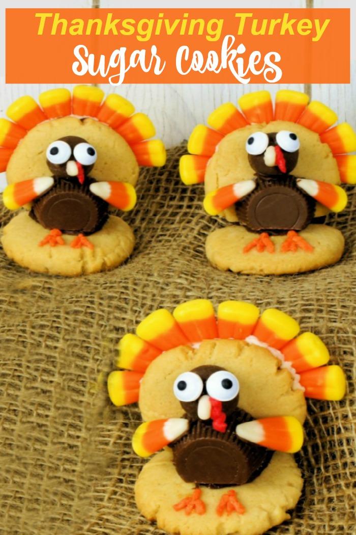 Three turkeys made of peanut butter cups, malted milk balls and candy corn with words reading: "Thanksgiving turkey sugar cookies."