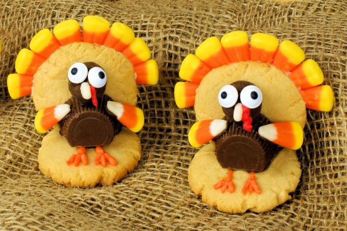 cookie turkeys for Thanksgiving Turkeys made of sugar cookies, peanut butter cups, malted milk balls and candy corn.