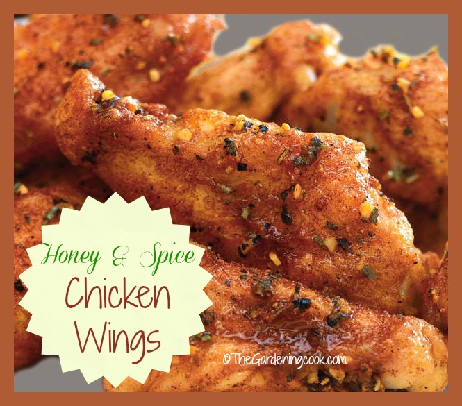 Honey spiced chicken wings with text overlay.