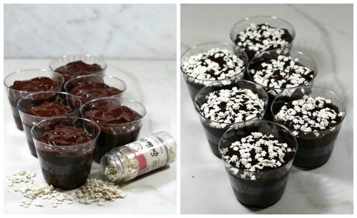 Adding snow sprinkles to dirt cups Chocolate dirt pudding with snowflake sprinkles on top.