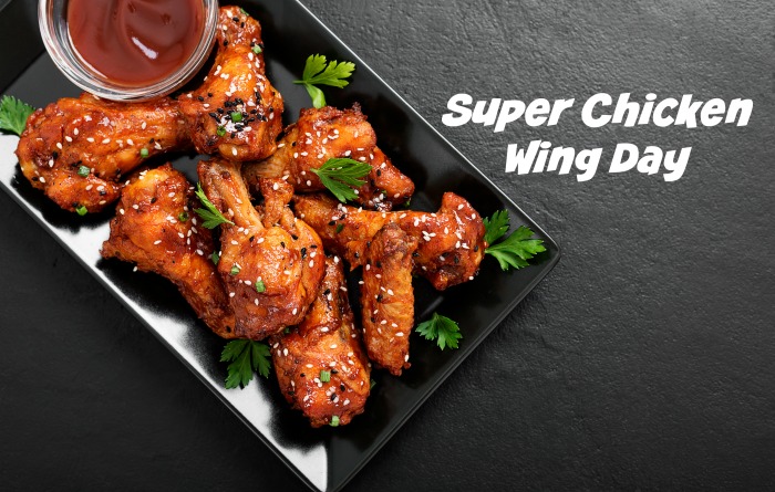 Super Chicken Wing Day Plattter of wings and sauce with words reading Super Chicken Wing Day.