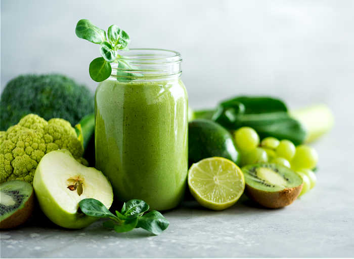 It's green food time. green juice, cauliflower, broccoli, grapes and apples with lime.