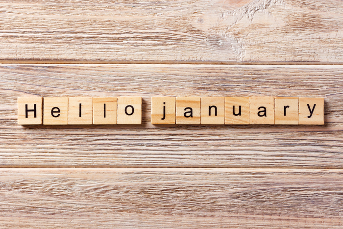 "Hello January" scrabble tiles. Scrabble tiles that read "hello January".