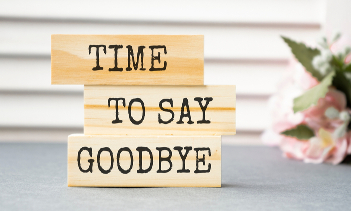 Blocks that read "Time To Say Goodbye" on a counter to celebrate Ditch New Year's Resolutions Day".