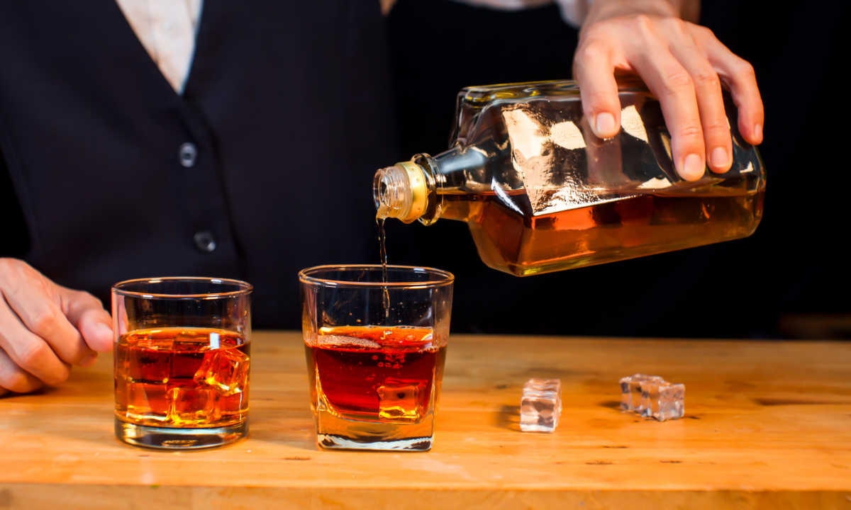 Bartender making drinks.