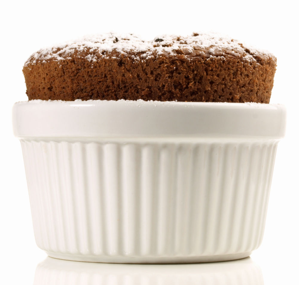 Chocolate soufflé in a ramekin.