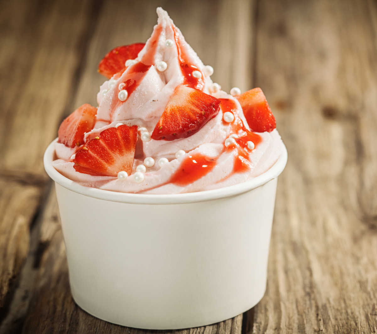 Frozen yogurt day Cup of strawberry frozen yogurt.
