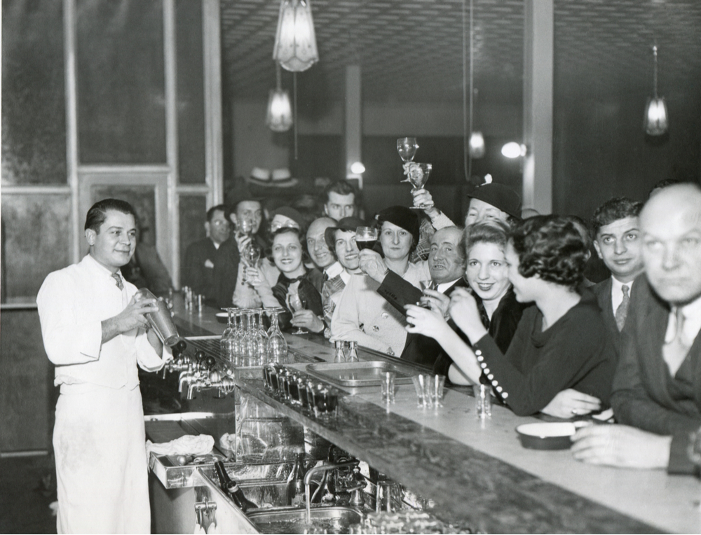 A vintage photo showing the history of bartending with a picture taken when prohibition ended in the United States.