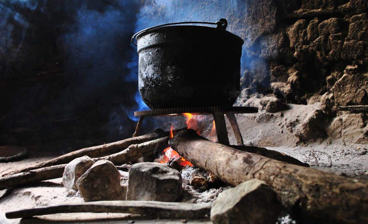 Soup pot over an open fire.